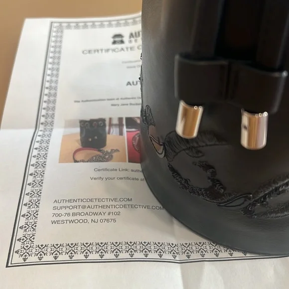 CHRISTIAN LOUBOUTIN
Marie Jane Black Leather Mini Bucket Bag - Picture 8 of 8